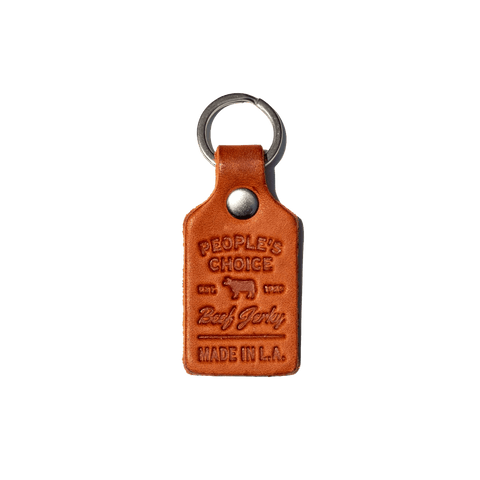 Photo of Merch - pcbj branded leather keychain