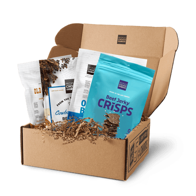 Assortment of savory and mild jerky bags in a jerky box. 