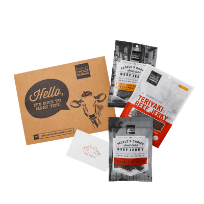 Front of Sweet Jerky Gram gift Set With Product Laid Out